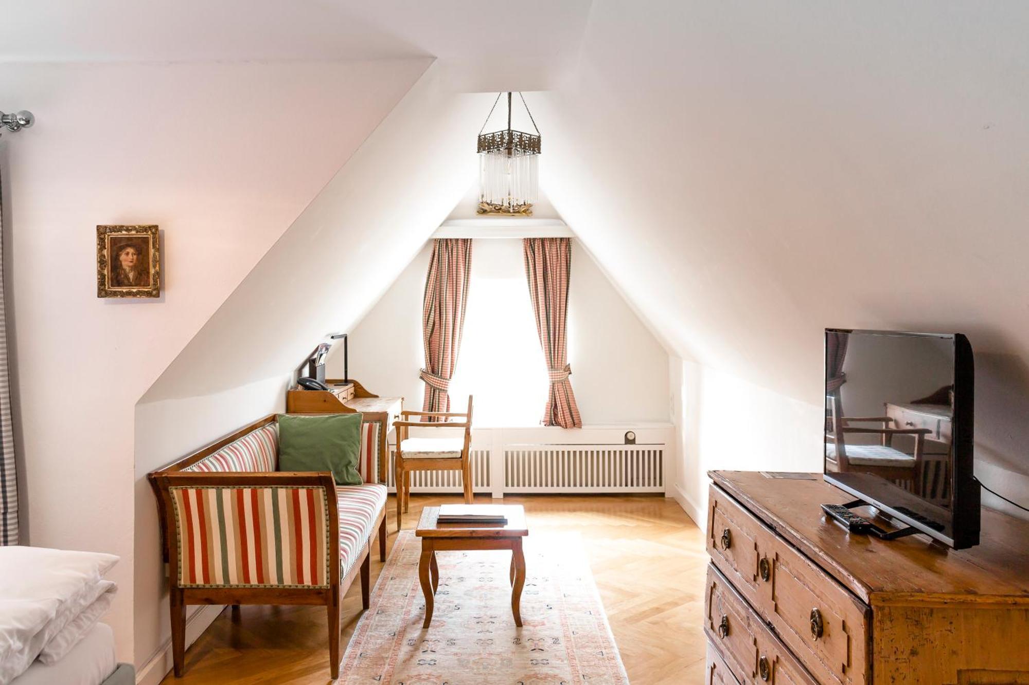 Schlossberghotel غراتس المظهر الخارجي الصورة A room in the hotel